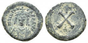 TIBERIUS II CONSTANTINE (578-582 AD). AE, Decanummium. Constantinople.
Obv: δ M TIЬ CON TA P P AV[G]. 
Crowned, draped and cuirassed bust facing.
R...