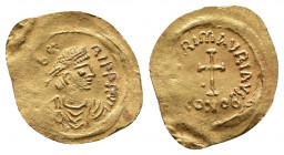 MAURICE TIBERIUS (582-602 AD). AV, Tremissis. Constantinople.
Obv: [δ N TI]ЬЄRI P P AVG. 
Diademed, draped and cuirassed bust right.
Rev: [VICTO]RI...