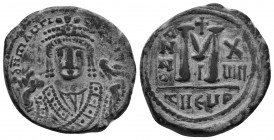 MAURICE TIBERIUS. (582-602 AD). AE Follis, Theoupolis (Antioch) mint, 3rd officina. Dated RY 18 (599/600). 
Obv: D N mAЧΓI - CN [P AЧT]
Bust facing,...