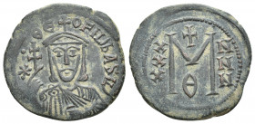 THEOPHILUS (829-842 AD). AE, Follis. Constantinople.
Obv: ✷ ΘЄOFIL ЬASIL. 
Crowned and draped bust facing, holding patriarchal cross and akakia.
Re...