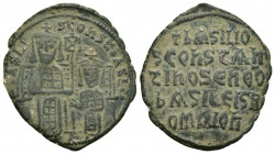 BASIL I THE MACEDONIAN with CONSTANTINE (867-886 AD). AE, Follis. Constantinople.
Obv: + ЬASILO S COҺST ЬASILIS. 
Basil and Constantine seated facin...