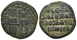 LEO VI with ALEXANDER (886-912 AD). AE, Follis. Constantinople.
Obv: + LЄOҺ S ALЄΞAҺδROS. 
Crowned figures of Leo and Alexander seated facing on dou...