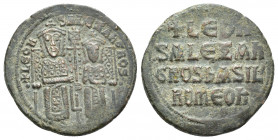 LEO VI with ALEXANDER (886-912 AD). AE, Follis. Constantinople.
Obv: + LЄOҺ S ALЄΞAҺδROS. 
Crowned figures of Leo and Alexander seated facing on dou...