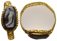 ANCIENT ROMAN GOLD RING / GEM STONE (1ST-5TH CENTURY AD.)
Eros
Condition : See picture. 
Weight : 2.93 g
Diameter: 22.13 mm