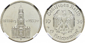 Drittes Reich. 
2 Reichsmark 1934 D. Garnisonskirche mit Datum. J. 355. In Plastikholder der NGC (slabbed) mit der Bewertung PF 64 CAMEO Prachtexempl...