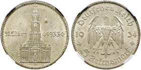 Drittes Reich. 
5 Reichsmark 1934 D. Garnisonskirche mit Datum. J. 356. In Plastikholder der NGC (slabbed) mit der Bewertung MS 65 vorzüglich-Stempel...