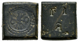 Ponderal. Ae. 6,63 g. French weight for Spanish coin of 2 Escudos. On the back countermarks I I - Я. Almost VF. Est...50,00. 

Spanish Description: ...