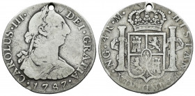 Charles III (1759-1788). 4 reales. 1787. Guatemala. M. (Cal-816). Ag. 12,95 g. Holed. Very rare. Choice F. Est...90,00. 

Spanish Description: Carlo...