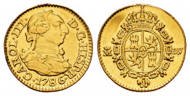 Charles III (1759-1788). 1/2 escudo. 1786. Madrid. DV. (Cal-1280). Au. 1,70 g. Tarces of mounting. VF. Est...90,00. 

Spanish Description: Carlos II...