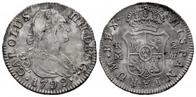 Charles IV (1788-1808). 2 reales. 1799. Madrid. MF. (Cal-607). Ag. 5,66 g. Minor scratches on edge. Delicate patina. VF/Choice VF. Est...35,00. 

Sp...