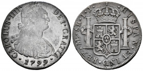 Charles IV (1788-1808). 8 reales. 1799. Lima. IJ. (Cal-917). Ag. 26,92 g. Slightly cleaned obverse. Toned. Choice VF. Est...100,00. 

Spanish Descri...