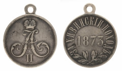 Alexander II. For Khiva Campaign, 1873. 
Silver award medal. Unsigned. Integrated loop. 28 mm. 13.1 gr. R2. VF. Barac 583; Diakov 804.1; Werlich 103....