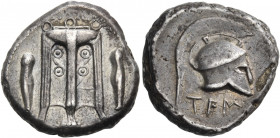 BRUTTIUM. Temesa. Circa 475-425 BC. Nomos (Silver, 19.5 mm, 8.18 g, 9 h). Between two greaves, tripod with three ring handles, and legs ending in lion...