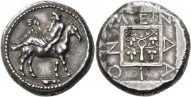 MACEDON. Mende. Circa 460-423 BC. Tetradrachm (Silver, 25 mm, 17.21 g, 6 h), c. 430-425. Dionysos, bearded and wearing a himation, reclining left on t...