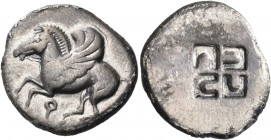 CORINTHIA. Corinth. Circa 550-500 BC. Stater (Silver, 22.30 mm, 7.52 g). Q Pegasos flying left. Rev. Quadripartite incuse square with swastika pattern...