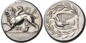 SIKYONIA. Sikyon. Circa 335-330 BC. Stater (Silver, 23.5 mm, 12.24 g, 2 h). ΣΕ Chimaera moving to the left on ground line, right paw raised; above to ...