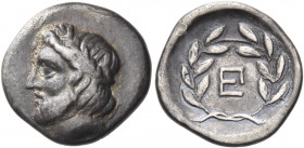 ARGOLIS. Epidauros. Circa 290s/280s-270s BC. Hemidrachm (Silver, 16.5 mm, 2.60 g, 9 h). Laureate and bearded head of Asklepios to left. Rev. Monogram ...