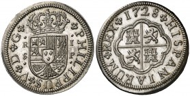 1728. Felipe V. Sevilla. P. 1 real. (Cal. 1714). 2,81 g. Bellísima. Brillo original. Rara así. S/C-.