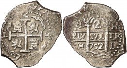 1702. Felipe V. Lima. H. 2 reales. (Cal. 1191). 6,45 g. Doble fecha y triple ensayador. Muy atractiva. Rara así. MBC+.