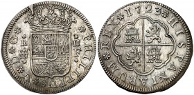 1723. Felipe V. Segovia. F. 2 reales. (Cal. 1404). 6,26 g. Ceca, valor y ensayador entre flores de seis pétalos. Bella. Parte de brillo original. Esca...