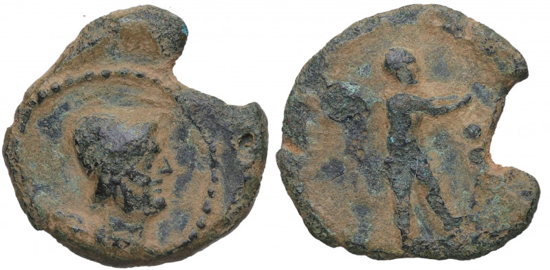 Siglo I a.C. Cástulo. Semis. (FAB. m17)((Abh-M17). Ae. 3,25 g. Cabeza de Vulcano...