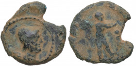 Siglo I a.C. Cástulo. Semis. (FAB. m17)((Abh-M17). Ae. 3,25 g. Cabeza de Vulcano a derecha, detrás de tenazas /Minero con pala, con tres puntos a la d...