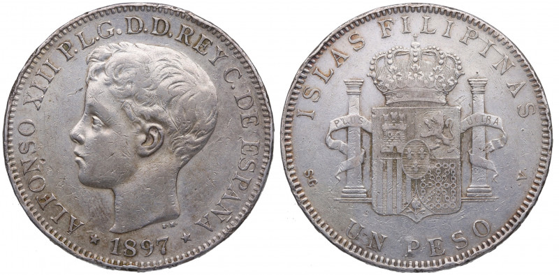 1897. Alfonso XIII (1886-1931). Manila. 1 Peso. SGV. A&C 122. Ag. 24,87 g. Escas...