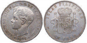 1897. Alfonso XIII (1886-1931). Manila. 1 Peso. SGV. A&C 122. Ag. 24,87 g. Escasa. MBC. Est.100.