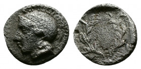 (Silver 0.37g 9mm) AEOLIS. Elaia. Obol (4th-3rd century BC). AR
Helmeted head of Athena left.
Rev: Wreath.
SNG München 383.