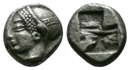 (1.26g 9mm Silver)Ionia. Phocaea. Ca. 500 BC. Silver hemihecte 
Female head left, wearing rosette earring and kekryphalos ornamented with band of dots...