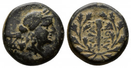 (3.50g 15mm Bronze) Lydia, Sardes. Ca. 133 B.C.-A.D. 14 AE 
 Laureate head of Apollo right, ΣΣP behind 
Rev.ΣAPΔI-ANΩN, club within oak wreath, monogr...