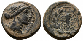 (Bronze, 3.38g 17mm) Lydia, Sardes. Ca. 133 B.C.-A.D. 14 AE 
 Laureate head of Apollo right 
Rev. ΣAPΔI-ANΩN, club within oak wreath, monogram.