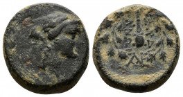 (Bronze, 4.35g 16mm) Lydia, Sardes. Ca. 133 B.C.-A.D. 14 AE 
 Laureate head of Apollo right 
Rev. ΣAPΔI-ANΩN, club within oak wreath, monogram.