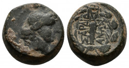 (Bronze, 6.09g 15mm) Lydia, Sardes. Ca. 133 B.C.-A.D. 14 AE 
 Laureate head of Apollo right 
Rev. ΣAPΔI-ANΩN, club within oak wreath, monogram.