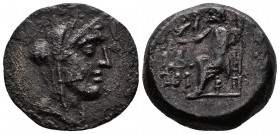 (Bronze, 6.85g 21mm) CILICIA, Adana. (?) 164-27 BC. AE
 Veiled head of Apollo right 
Rev.Zeus Nikephoros seated left; monograms to left.