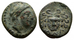 (Bronze, 1.38g 12mm) CILICIA. Mallos. Ae (4th century BC). AE
Head of river god Pyramos right, wearing grain wreath. 
Rev: ΜΑΛ. Facing gorgoneion. 
Zi...