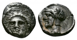 (Silver 0.71g 9mm) Cilicia. Tarsos. Time of Pharnabazos and Datames circa 384-361 BC. Obol AR
Facing female head, head turned slightly left,
Rev: Bear...