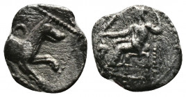 (0.51g 11mm Silver) LYCAONIA. Laranda. Obol (4th century BC). 
 Baaltars seated left, holding grain ear, grapes and sceptre. 
 Rev: Forepart of wolf r...