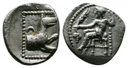 (Silver 0.65g 12mm) LYCAONIA. Laranda. Obol (Circa 324/3 BC).
Baal seated left on throne, holding grain ear, grape bunch and sceptre.
Rev: Forepart of...