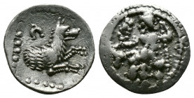 (Silver 0.69g 13mm) LYCAONIA. Laranda. Obol (Circa 324/3 BC).
Baal seated left on throne, holding grain ear, grape bunch and sceptre.
Rev: Forepart of...