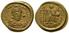 (Gold, 4.46g 22mm) JUSTINIAN I (527-565). GOLD Solidus. Constantinople.
Helmeted and cuirassed bust facing slightly right, holding spear and shield de...