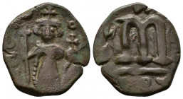 (Bronze, 3.43g 22mm) Constans II, 641-668.(?) Follis Constantinople, 
 Constans II standing facing, wearing crown surmounted by cross, holding long cr...
