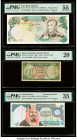 Iran, Qatar & Dubai, Saudi Arabia and United Arab Emirates Group Lot of 5 Graded Examples PMG About Uncirculated 55; About Uncirculated 53; Choice Ver...