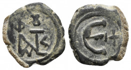 Justin II Æ 5 Nummi. Antioch, AD 569-578. Monogram 2.2gr 14.9mm