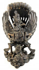 Indonesien-Bali
Varia
Holzskulptur des Gottes Indra auf der Schulter eines zweiköpfigen Flügelwesens, welches auf der Schildkröte Akupara reitet. Hö...