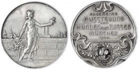 Bayern-München, Stadt
Silbermedaille 1904, auf die Rassehundeausstellung. Weibliche Person mit Lorbeerzweig vor Mauer, im Hintergrund Stadtansicht/se...