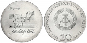 Gedenkmünzen der DDR
20 Mark 1975, Bach. Randschrift läuft rechts herum.
fast Stempelglanz. Jaeger 1555.