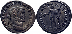 ROMA IMPERIO. Diocleciano. P y estrella. Follis. EBC. Elegante retrato