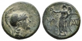 Aeolis, Aigai. 2nd-1st centuries BC. Æ (15mm, 3.62g). Helmeted head of Athena right. / AIΓAEΩN. Nike advancing left, holding wreath and palm; monogram...