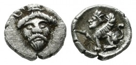 Cilicia, Uncertain. ca.4th century BC. AR Hemiobol (8mm, 0.38g). Bearded head facing (Baal?), hair bound. / Sphinx seated left, forepaw raised. Milden...